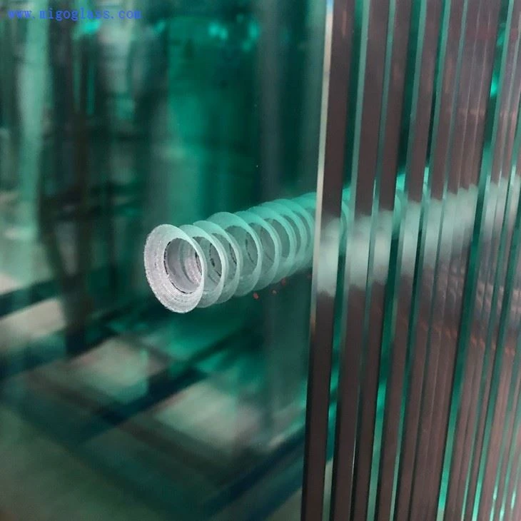 Padel court glass hole